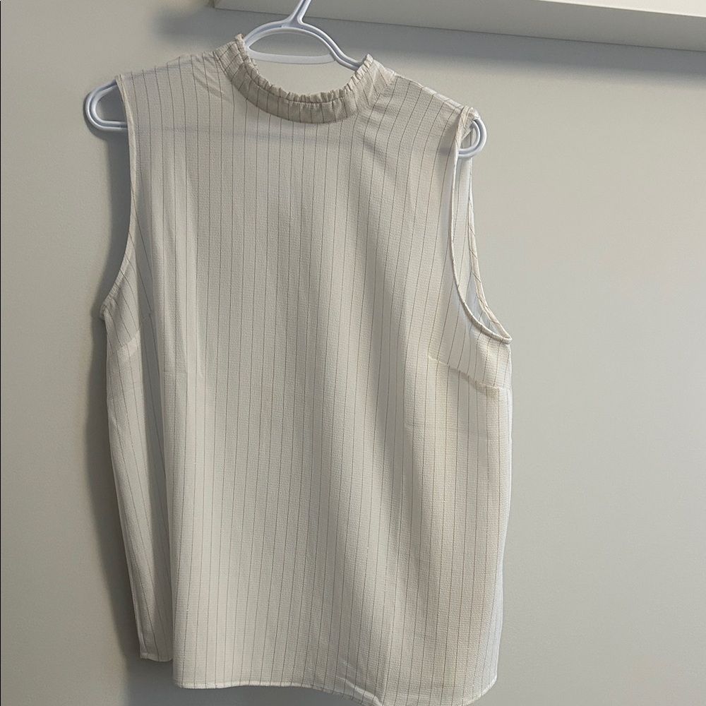 Elegant Sleeveless Cream Blouse